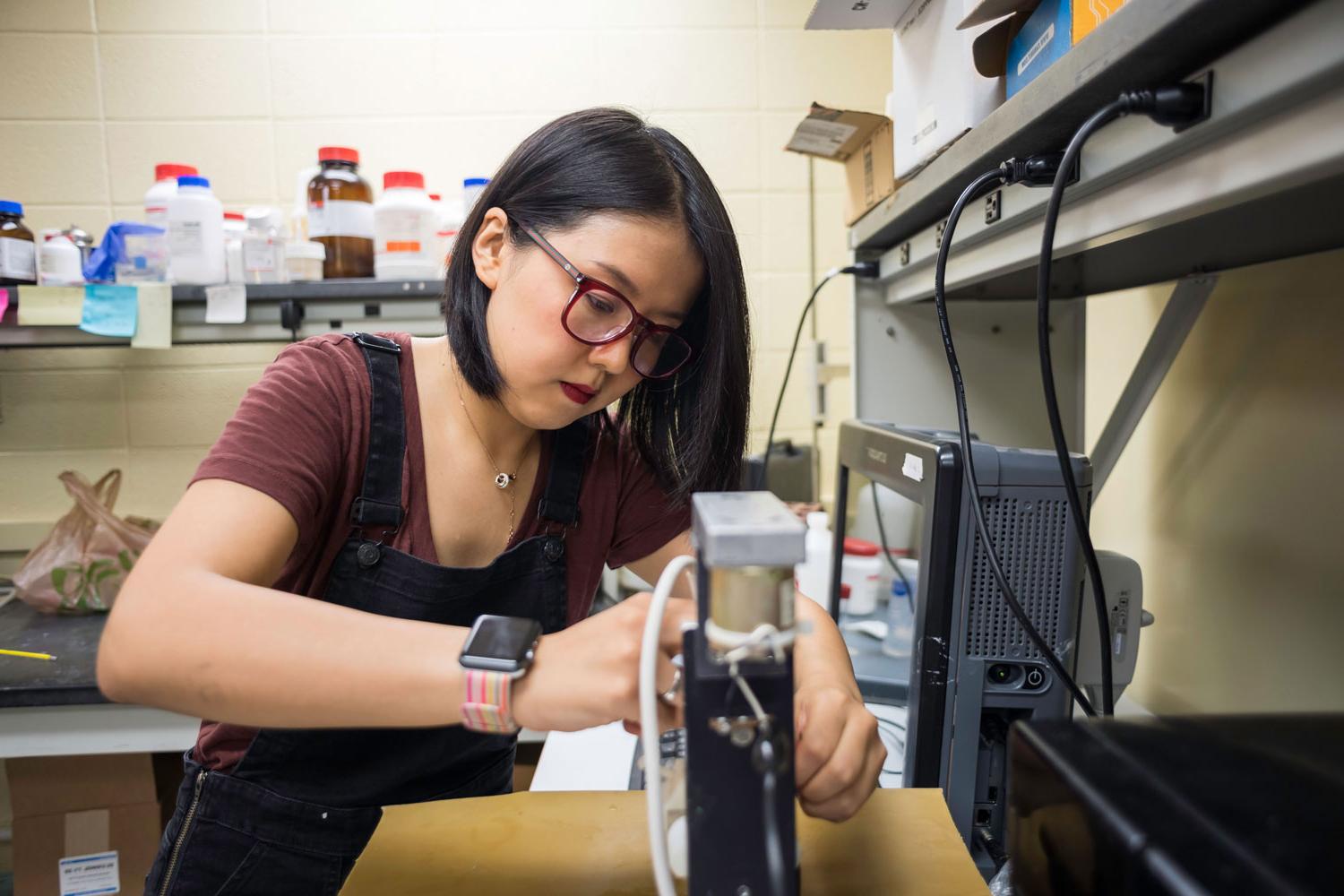 Tier one research student in lab at University of Rochester